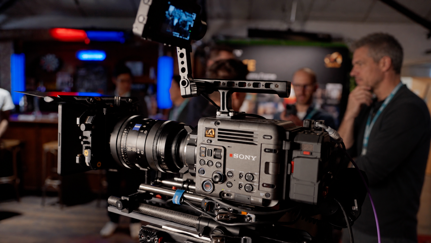 A Sony Burano cinema camera on set with Jack Laster and crew in the background